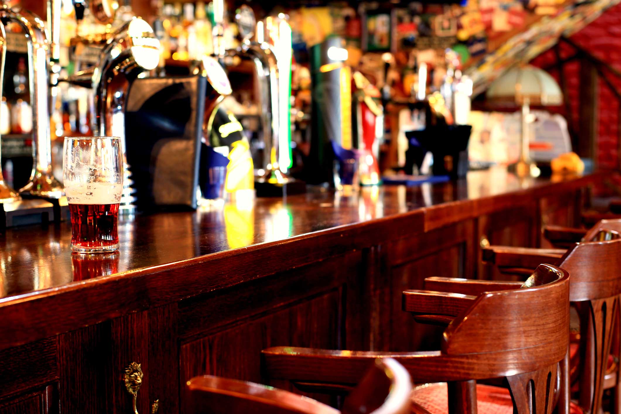 Chrome beer taps with highlights in the pub